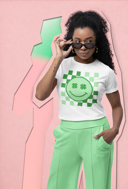 Shamrock Eyes Smiley Face Checkered Background St. Patrick's Day Graphic Tee